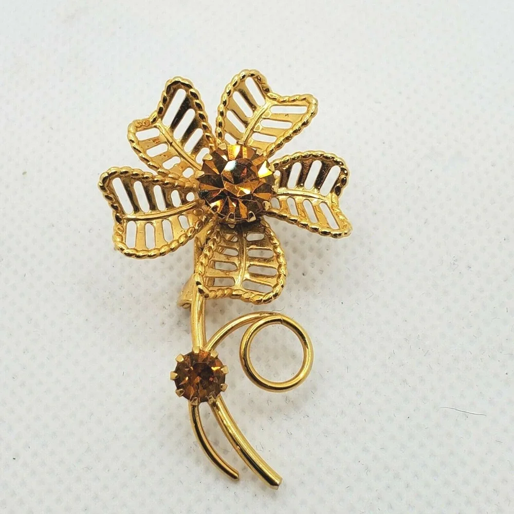 Vintage Open work Gold Tone Metal Flower w/Topaz color Rhinestones Brooch Pin